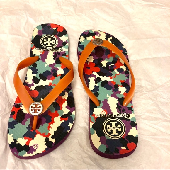 white and clear puma slides